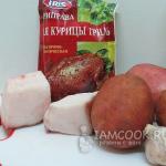 Accordion potatoes with lard in the oven